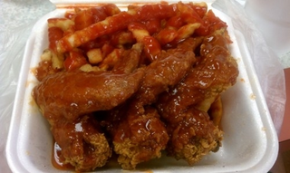 Chicken wings and fries with mumbo sauceTumblr